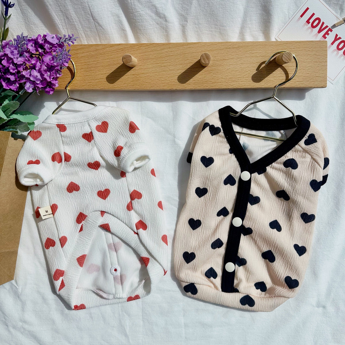 NKpup heart top shirts for dogs in white with red hearts and cream with navy hearts.