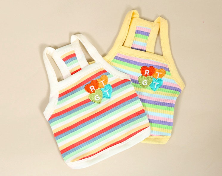 NKpup Rainbow Ribbed Top dog shirts in white and yellow with colorful stripes and heart patches
