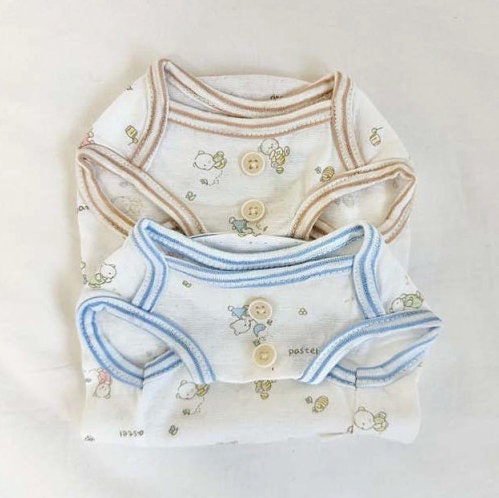 NKpup GOTS organic jacquard dog shirts in white with pastel patterns and button closures