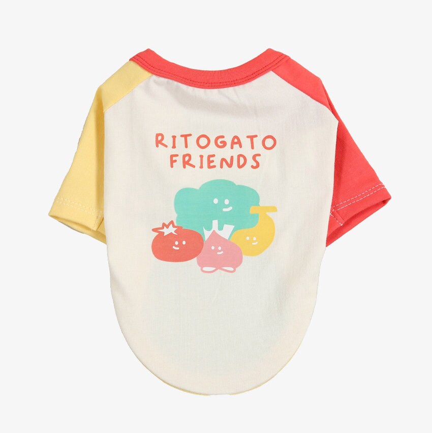 NKpup Veggie Color Block dog shirt with red, yellow, and white sleeves and a cartoon vegetable print.