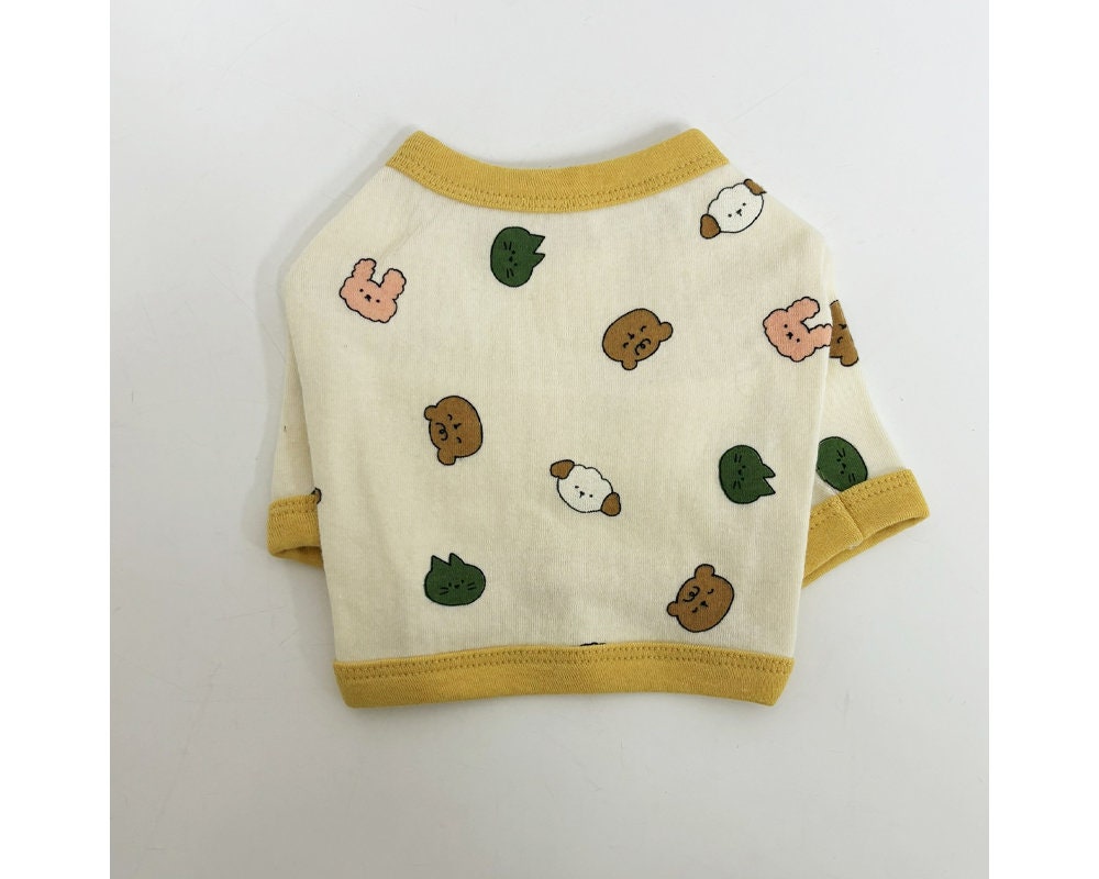 Zoo Crop Top dog shirt in cream with colorful animal face patterns and yellow trim