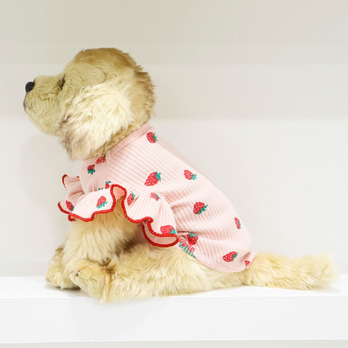 Pink NKpup strawberry patterned dog shirt with ruffled hem