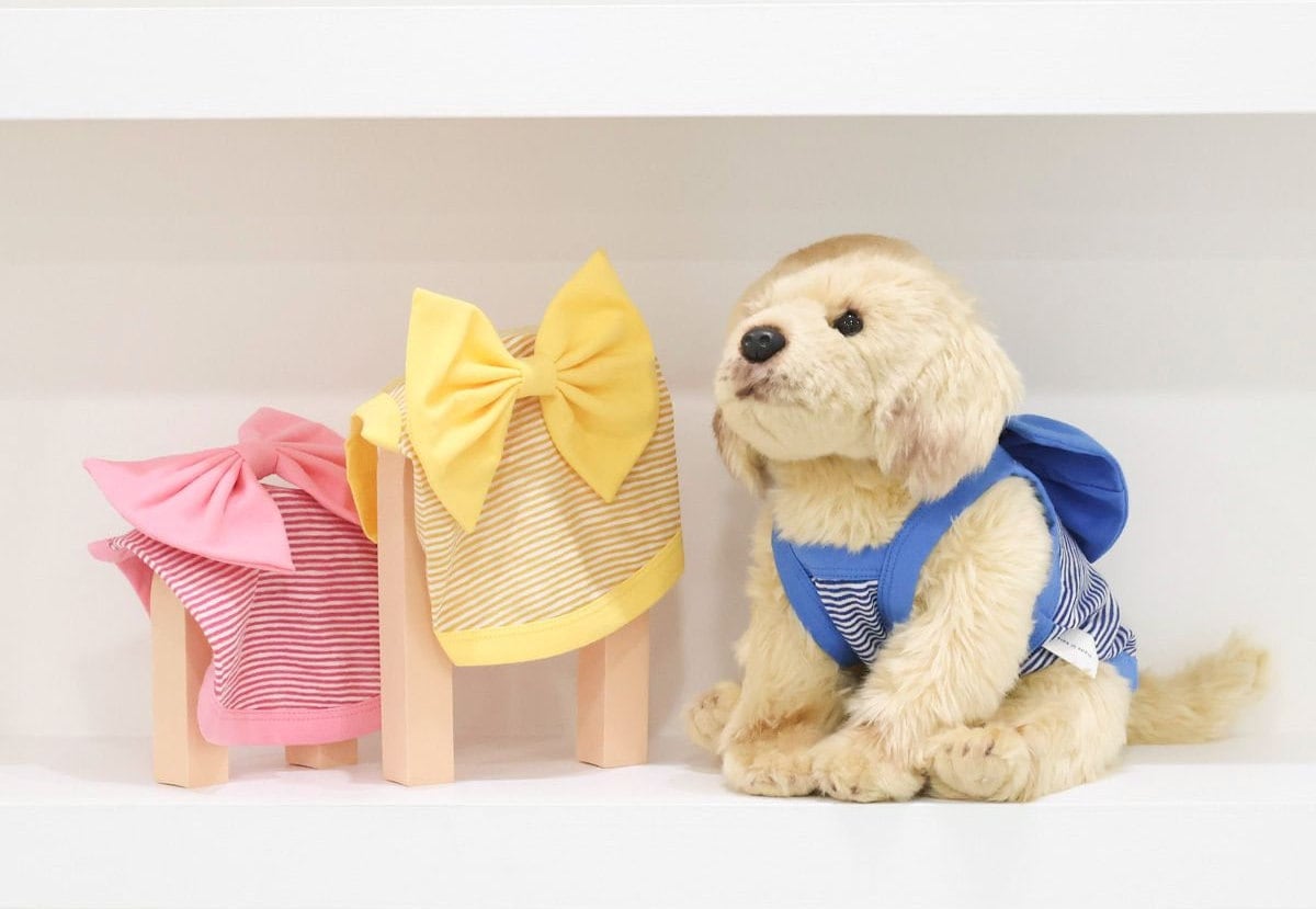 NKpup Ribbon Stripe Top pet clothing in pink, yellow, and blue striped patterns with large bows.