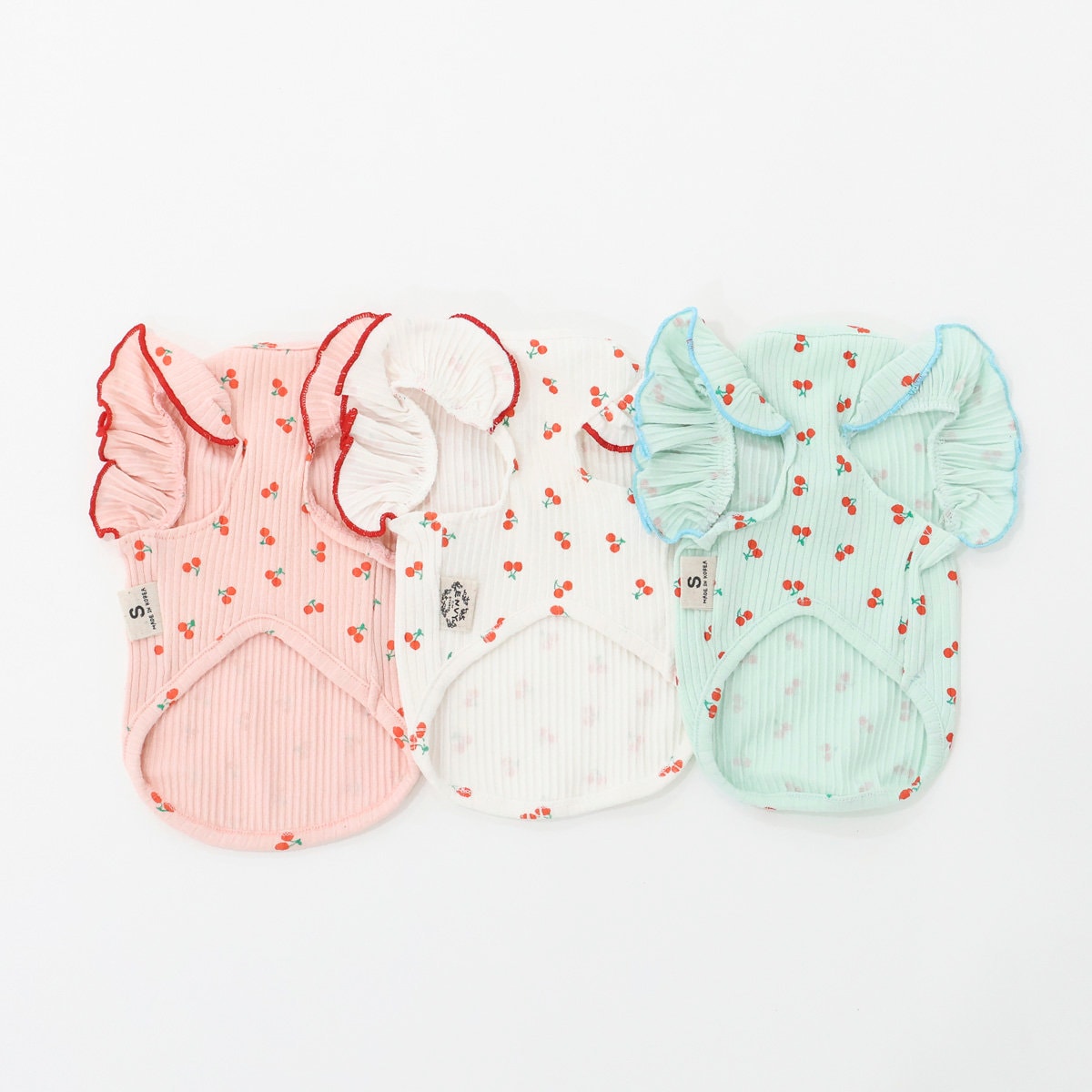 Cherry Ribbed T-Shirt dog shirts in pink, white, and mint green with ruffle sleeves