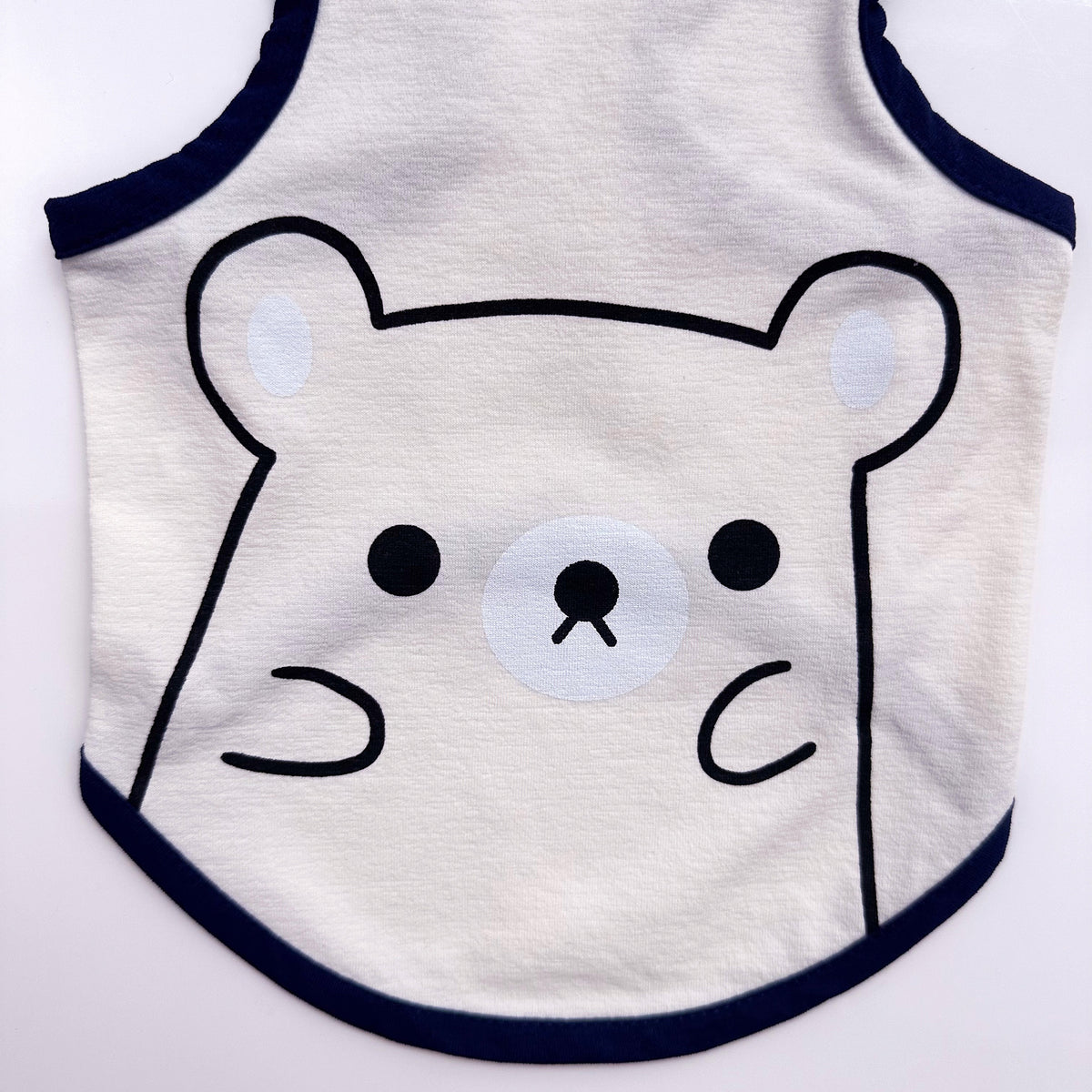 NKpup Cutie Bear dog tank top in white with a navy blue trim and cute bear face design