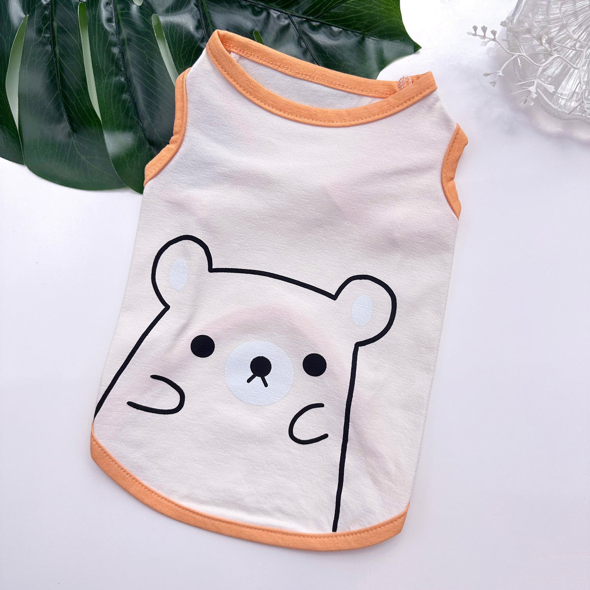 NKpup Cutie Bear dog tank top in cream with a cute bear face design and orange trim