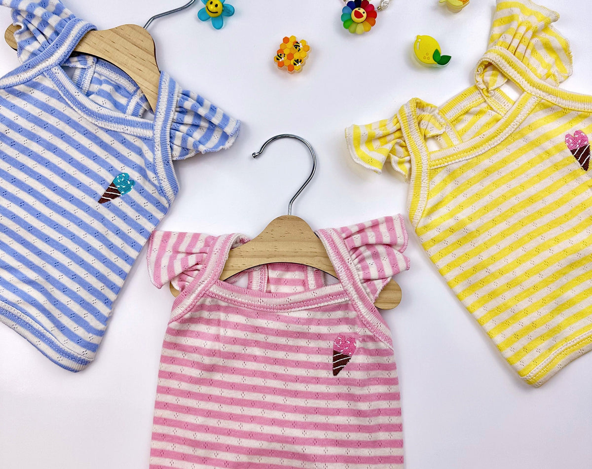 Three NKpup Ice-Cream Eyelet Tops for dogs in blue, pink, and yellow stripes with ice cream cone patches.
