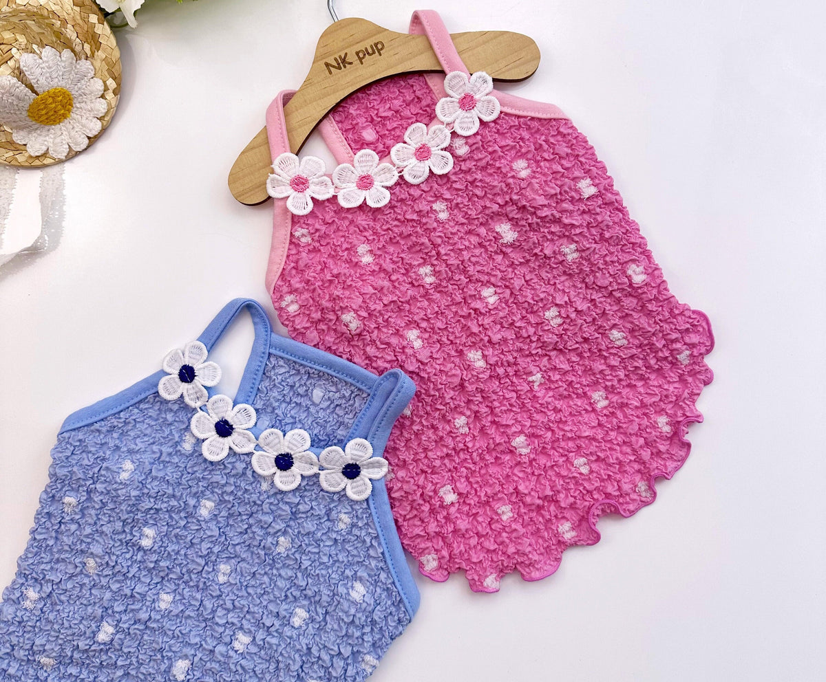 NKpup Daisy Ruffle Dress for dogs in pink and blue with white flower accents.