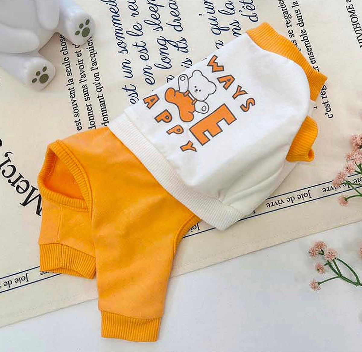 Always Be Happy Dog Overall in white and orange with graphic text and puppy print