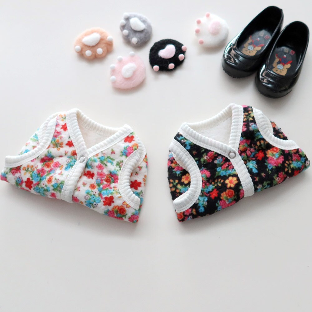NKpup Floral Boa Fleece Dog Vests in colorful floral and black floral patterns