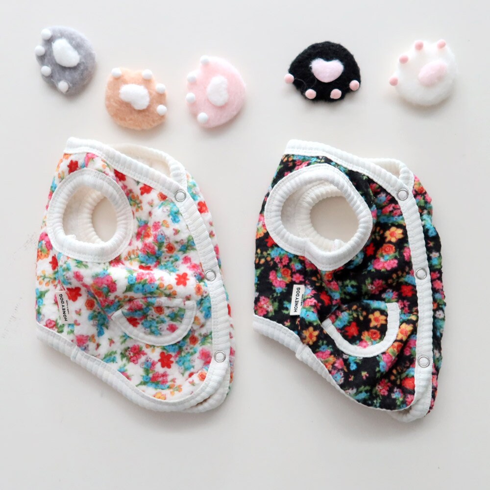 NKpup Floral Boa Fleece Dog Vests in white and black floral patterns.