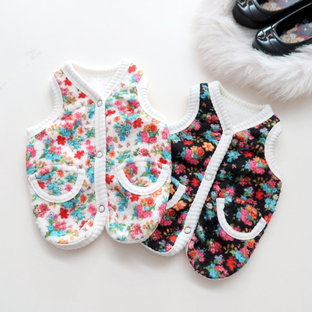 NKpup Floral Boa Fleece Dog Vests in white and black floral patterns with front pockets.