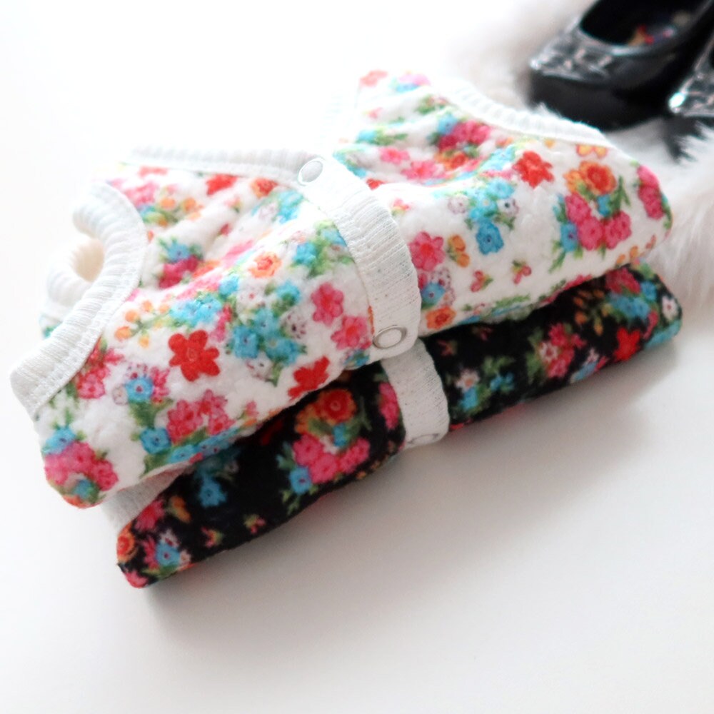 NKpup Floral Boa Fleece Dog Vests in white and black floral patterns