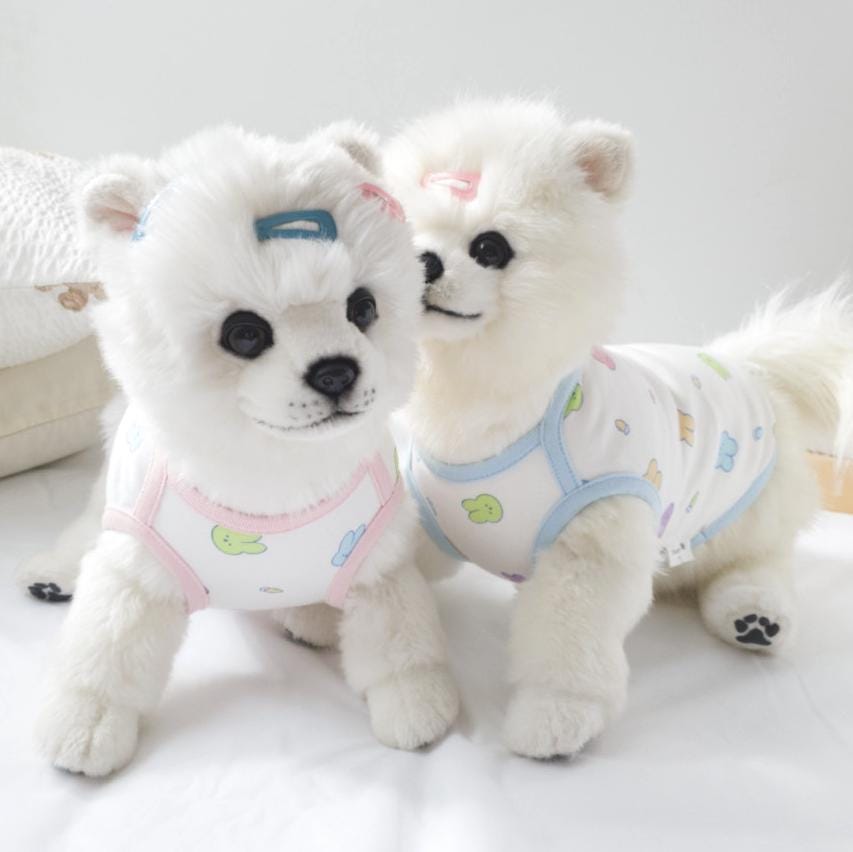 NKpup GOTS organic bunny pattern dog shirts in white with pastel pink and blue trim.