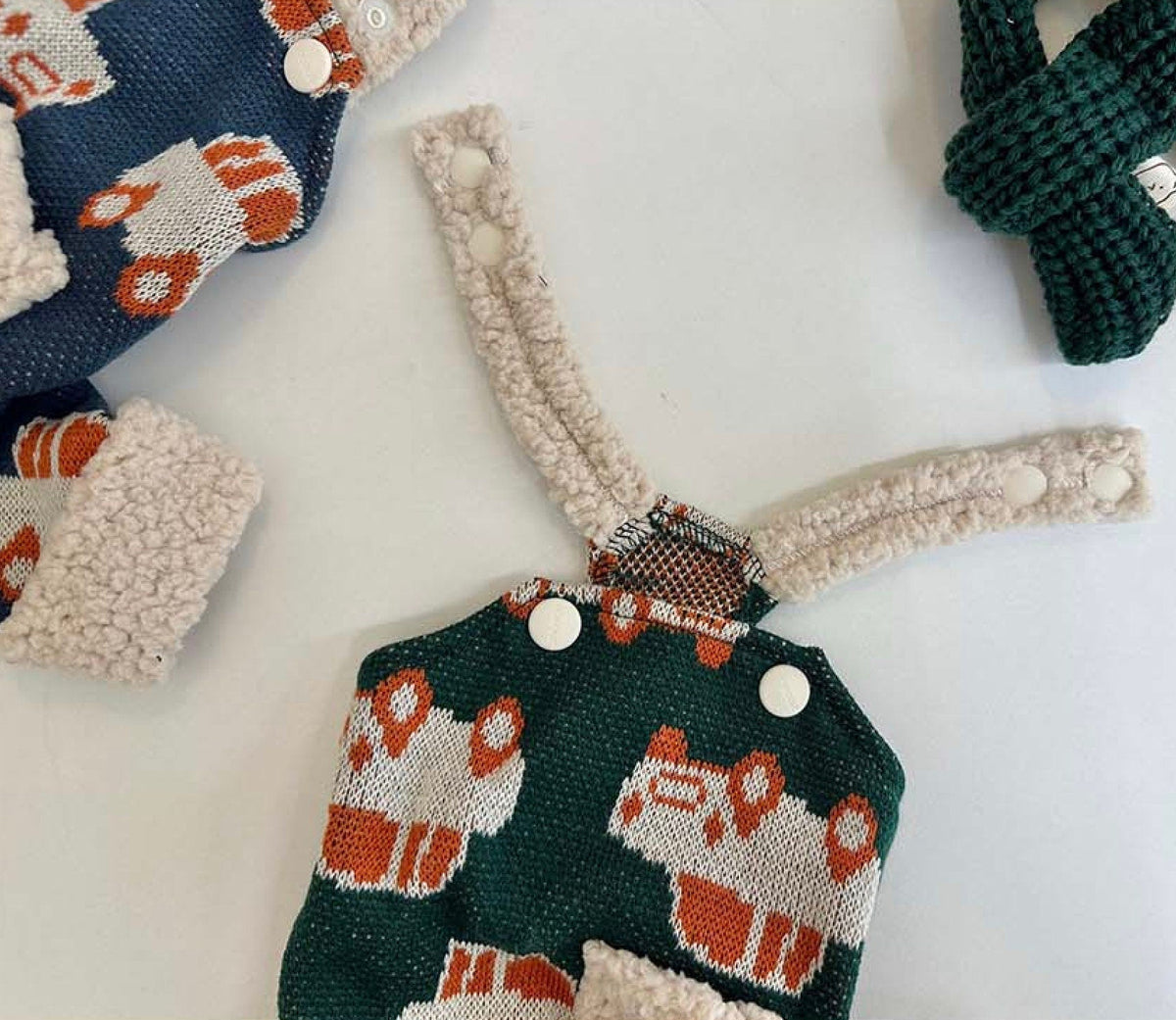 Green Truck Dog Suspender Overall with white buttons and sherpa trim