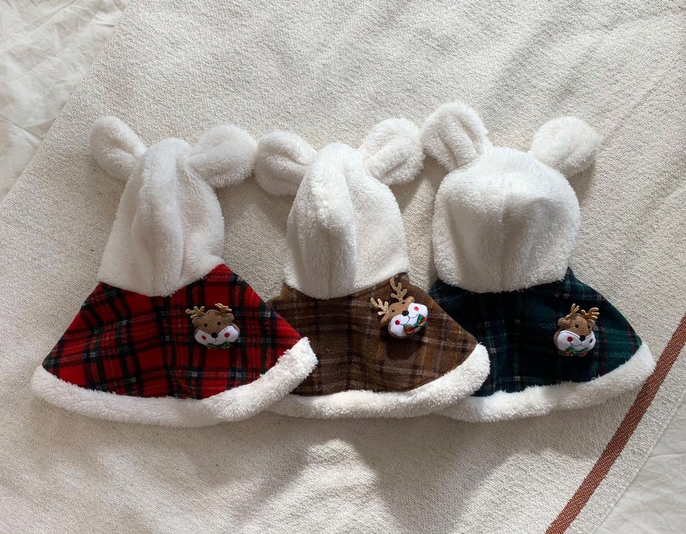 Christmas plaid dog hoodie capes in red, brown, and green with reindeer patches and white fleece trim