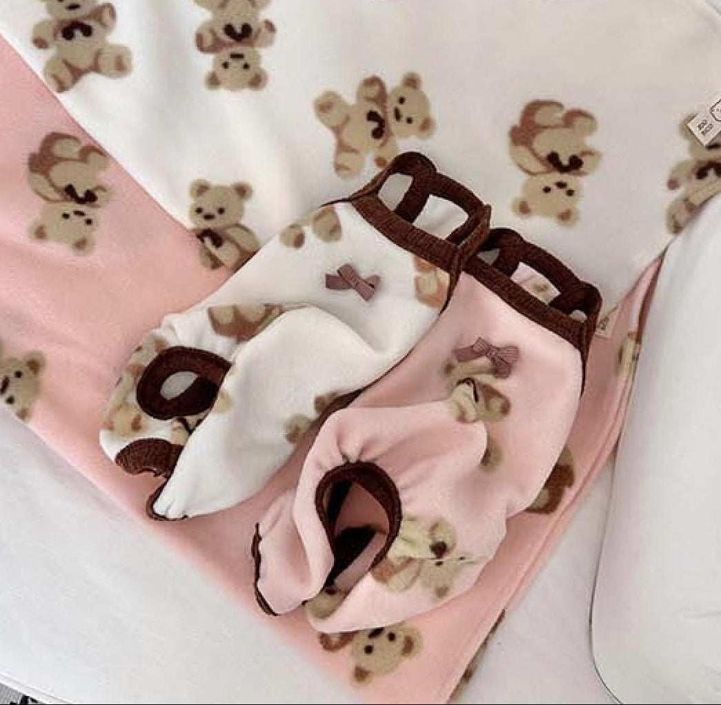 NKpup Teddy Fluffy Dog Overalls in white and pink with brown teddy bear patterns and bow details.