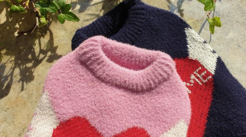 Pawsome Heart Knit Dog Vest in pink and navy with red heart pattern