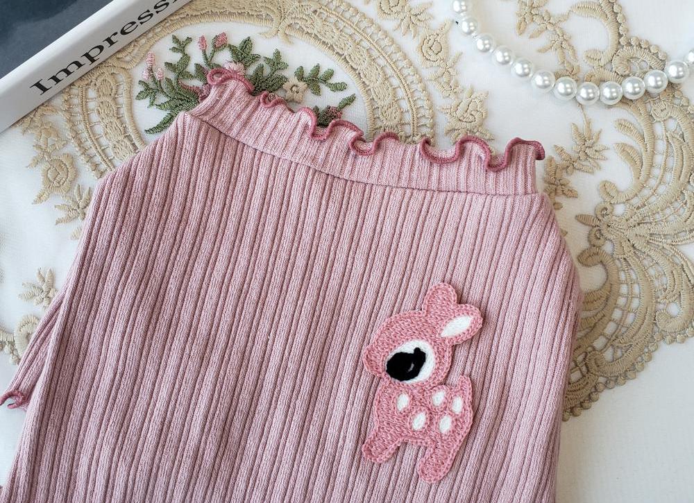 NKpup Frilly Deer Ribbed Tee in pink with a cute deer patch and ruffled collar.