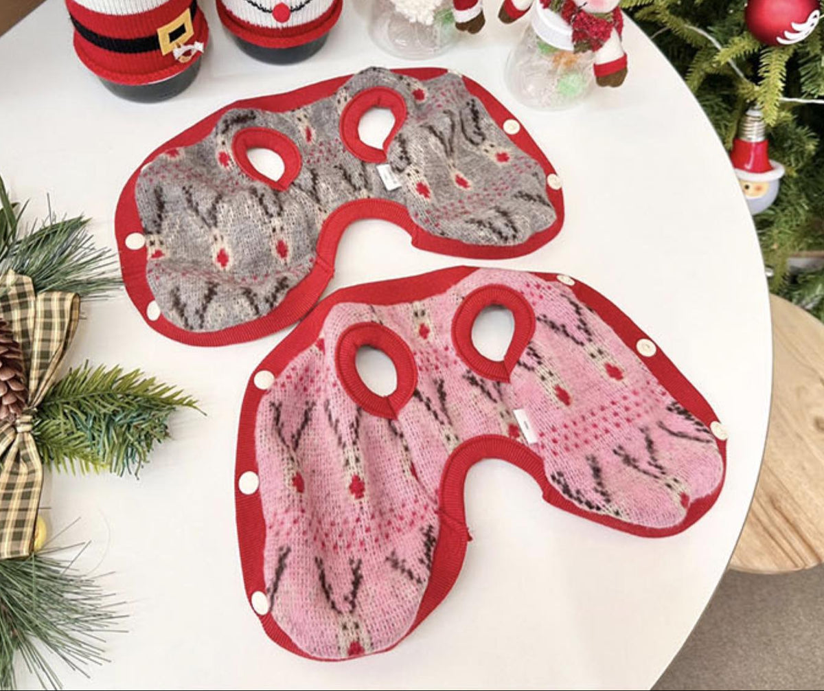 NKpup Christmas reindeer knit dog vests in grey and pink patterns with red trim.