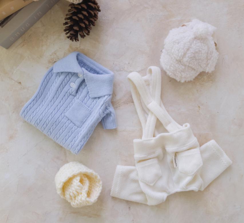 NKpup cable polo knit dog sweaters in light blue and cream with matching knit hats