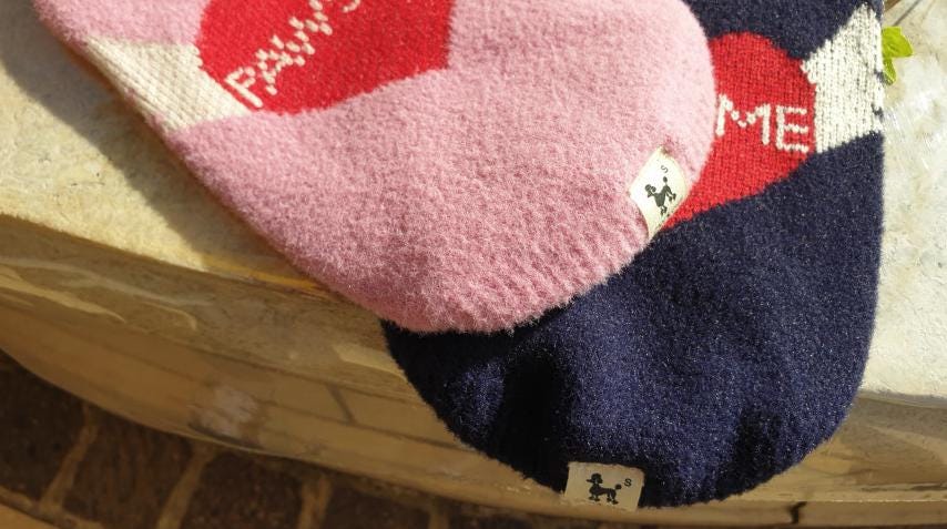 Pink and navy blue Pawsome Heart Knit Dog Vest with red heart pattern.