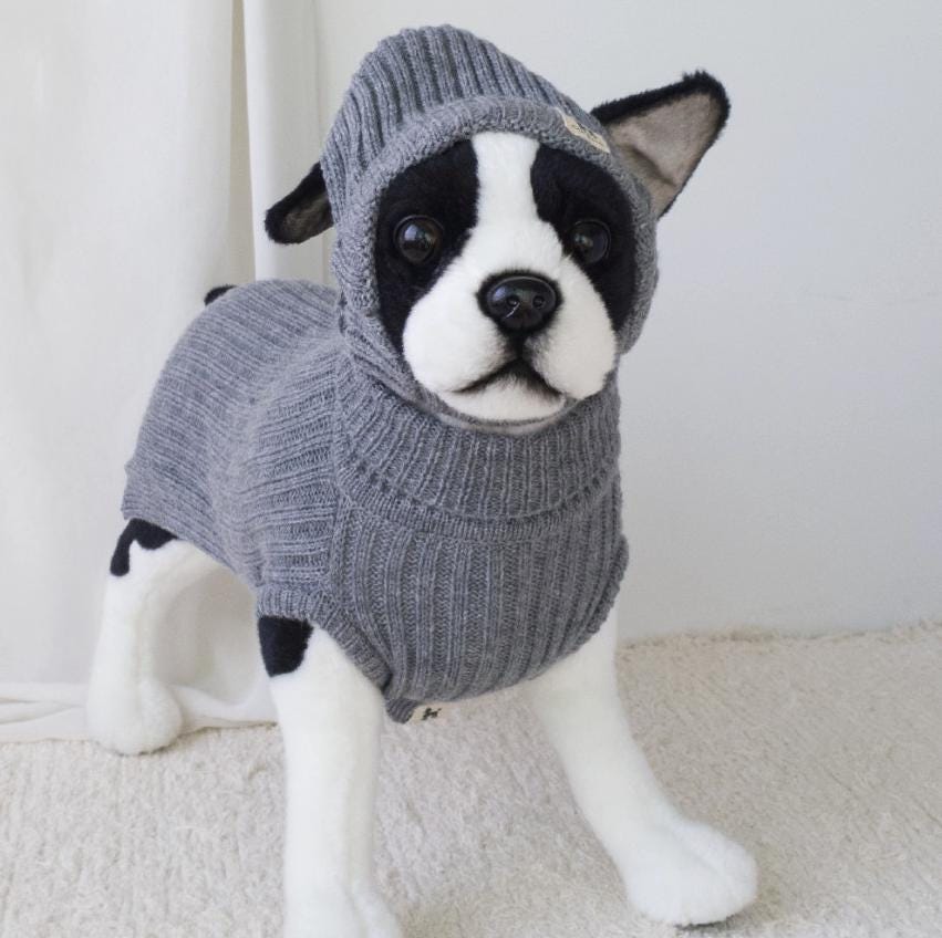 Grey ribbed turtleneck knit dog vest with a matching hood