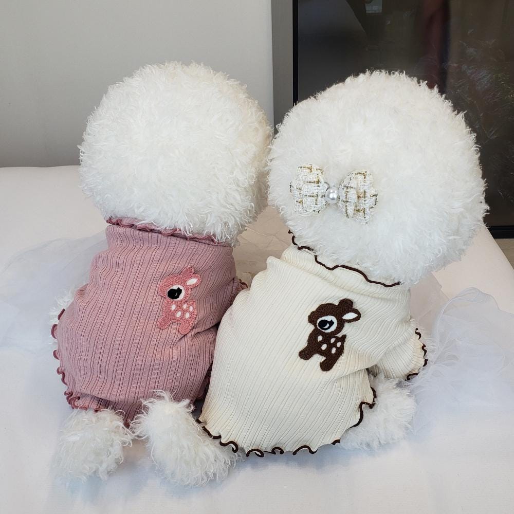 NKpup Frilly Deer Ribbed Tee dog shirts in pink and cream with deer embroidery and ruffle trim.