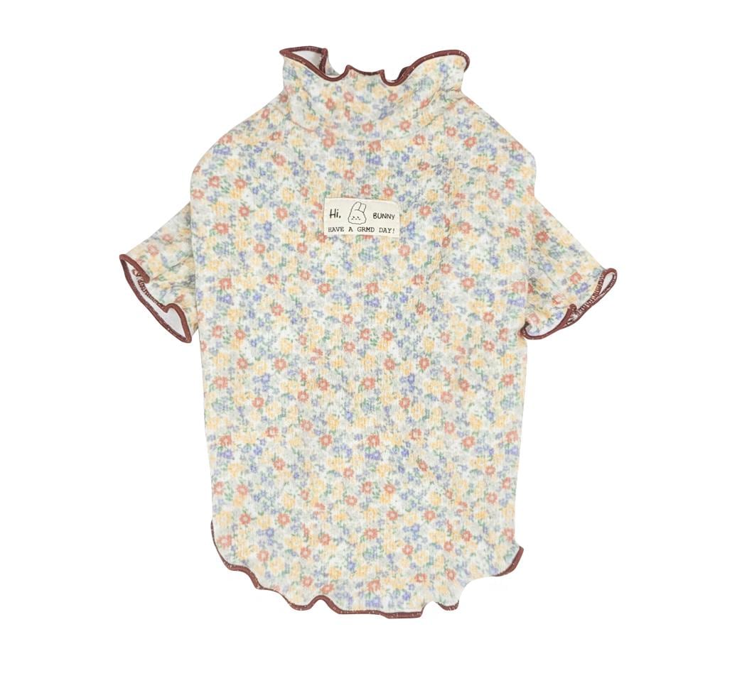 Blossom Ruffle Dog Shirt with a floral pattern and ruffled collar and sleeves.