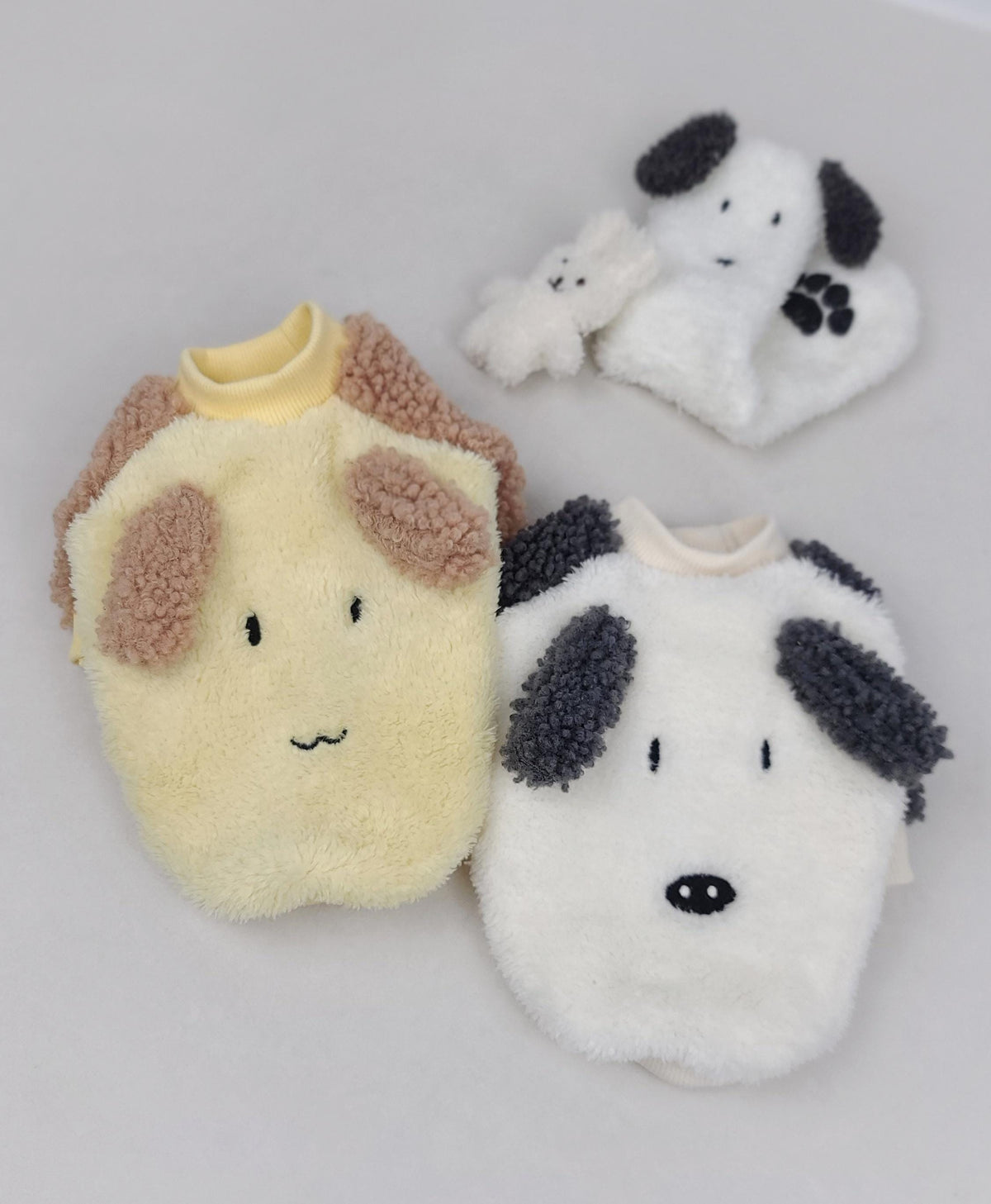 Three fluffy ear dog sweatshirts in yellow and white with contrasting ear colors.