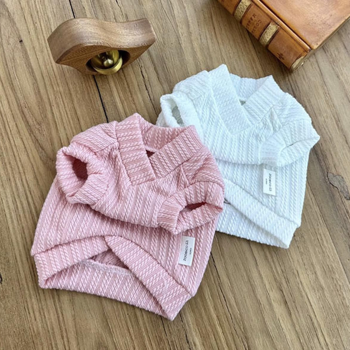 NKpup Eyelet Crop Top pet shirts in pink and white textured fabric.