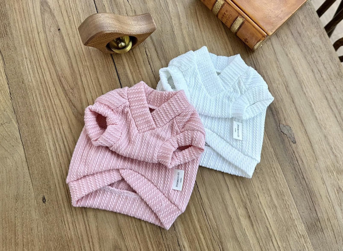 NKpup Eyelet Crop Top pet shirts in pink and white textured fabric.