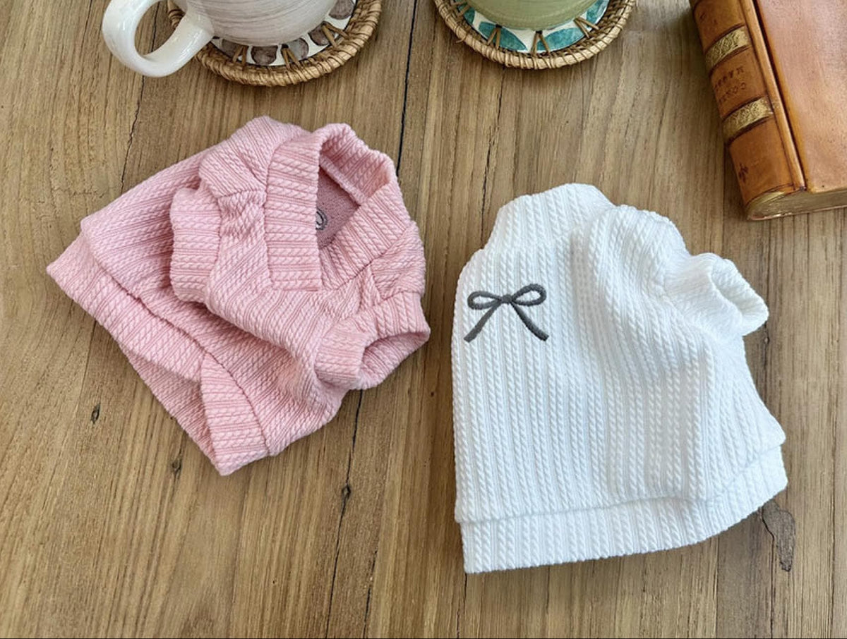 NKpup Eyelet Crop Tops for dogs in pink and white with a bow detail