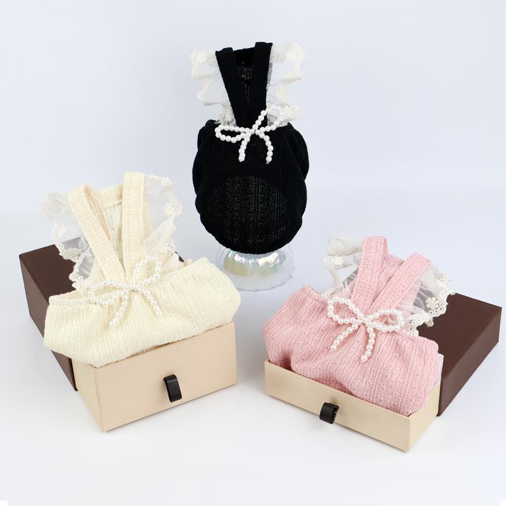 NKpup Pearl Ruffle Tops for dogs in black, cream, and pink with lace trim and pearl bow details
