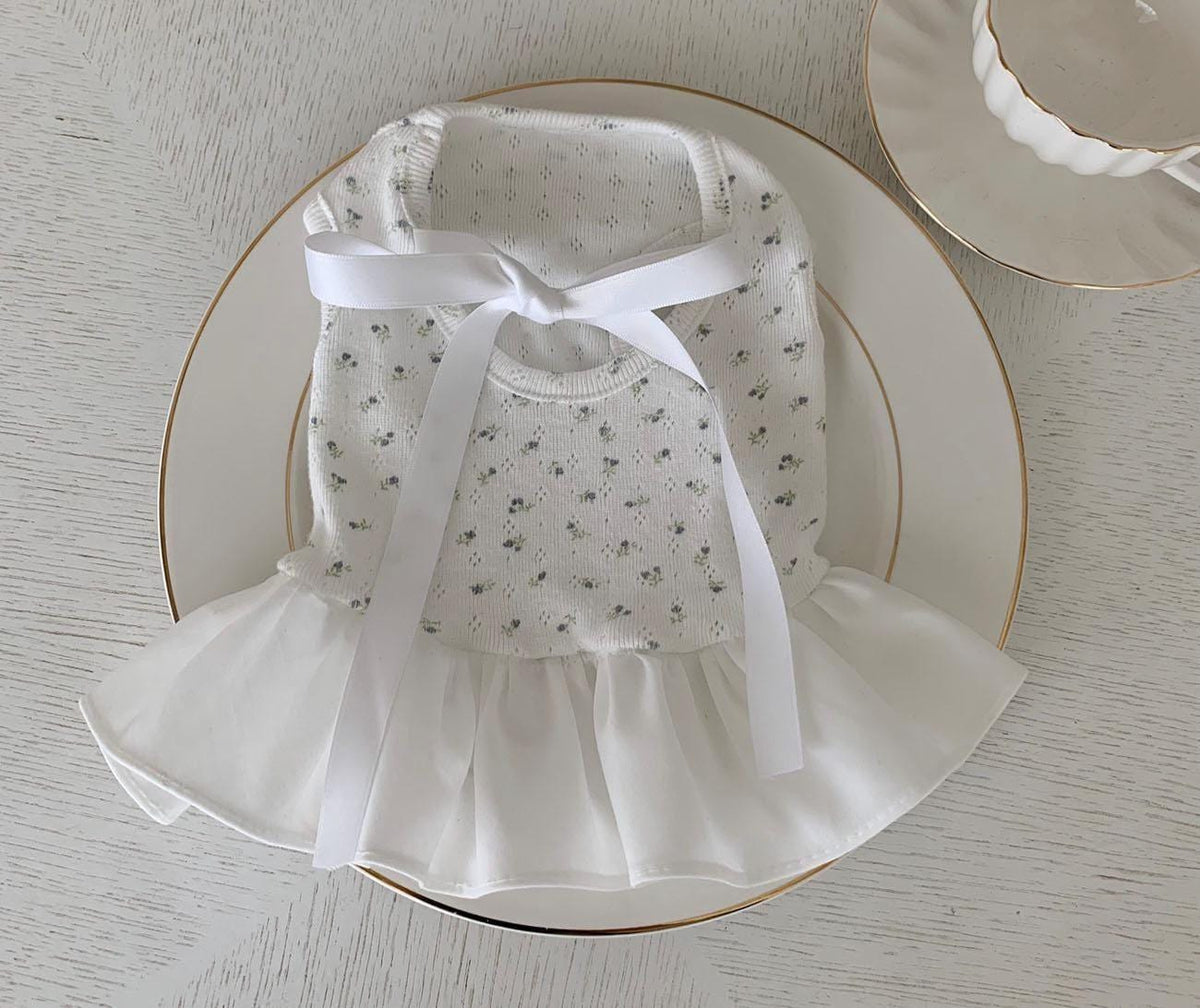 NKpup Tiny Flower Ribbon dog dress in white with a delicate floral pattern and bow detail.
