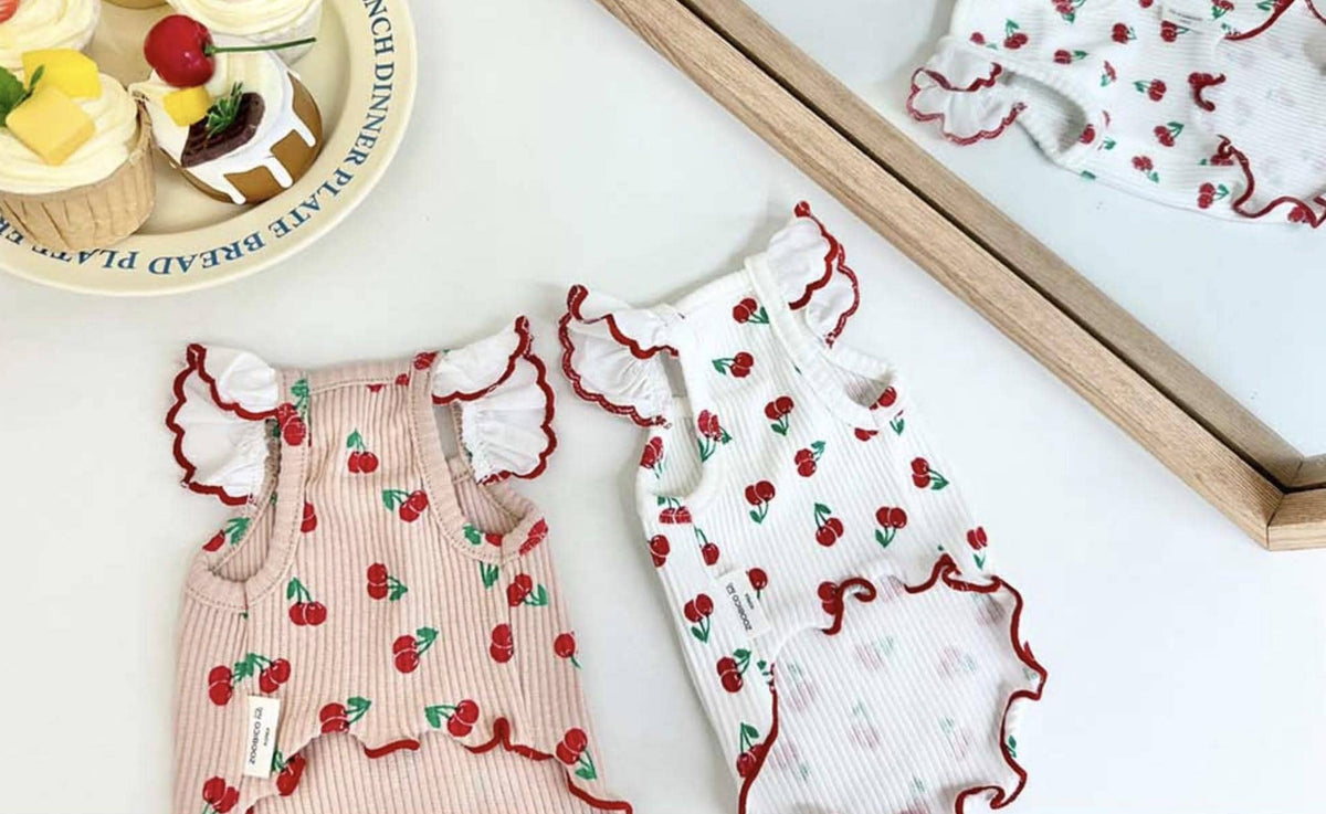 NKpup Cherry Frill Ribbed Top for dogs in pink and white with cherry patterns and ruffled edges