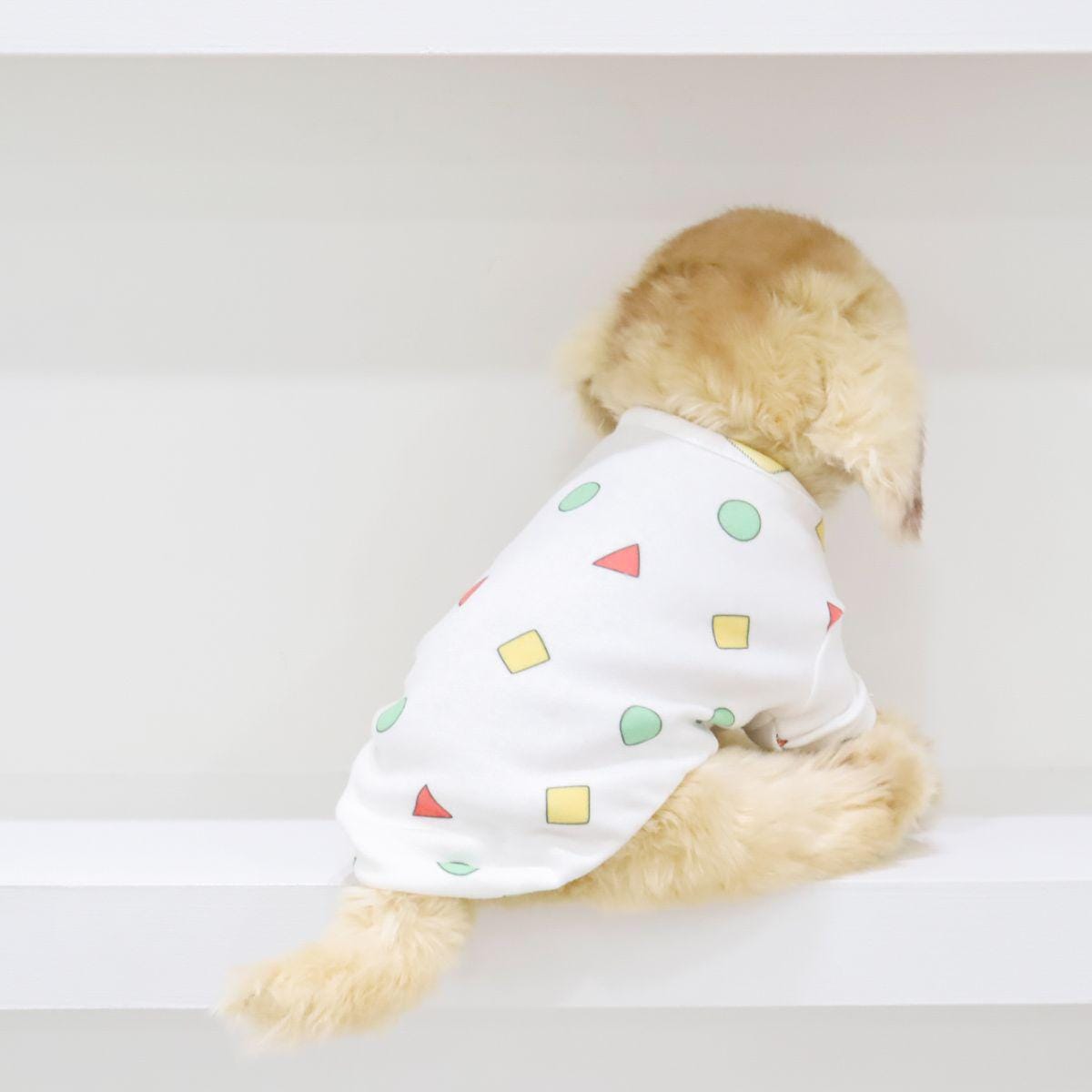 NKpup Geo Shapes T-shirt for dogs featuring a colorful geometric pattern on white fabric