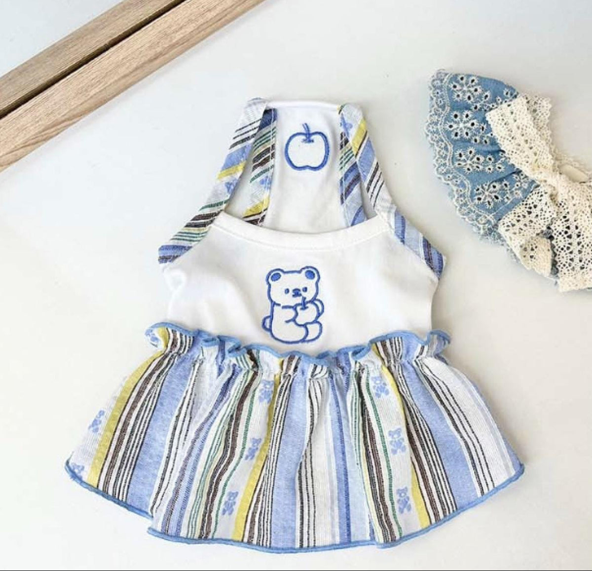 NKpup striped bear dog dress with blue and white patterns and a matching lace bow accessory