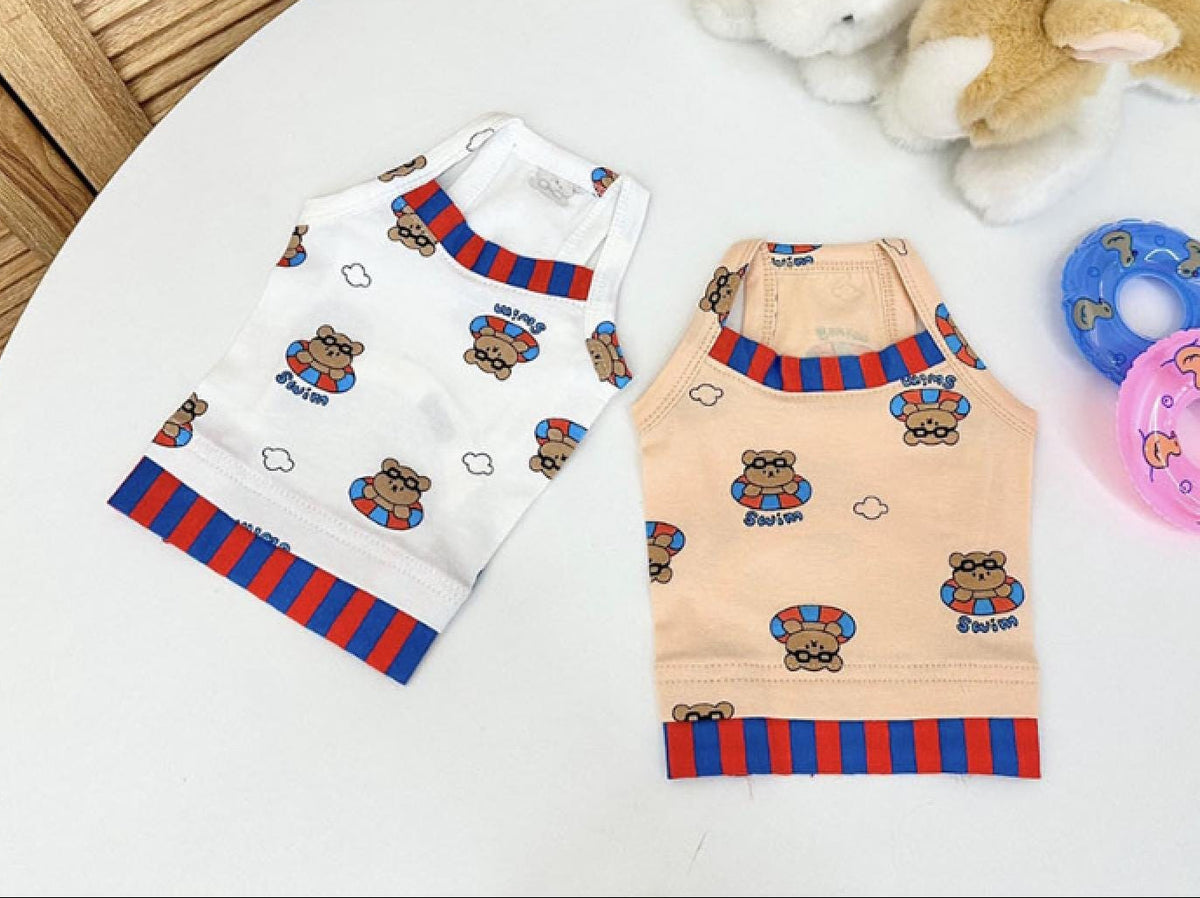 NKpup Teddy Float Top dog shirts in white and peach with teddy bear patterns and blue and red stripes.