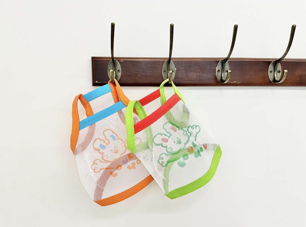 NKpup Bunny Mesh Tank Tops for dogs in orange and green with bunny patterns.