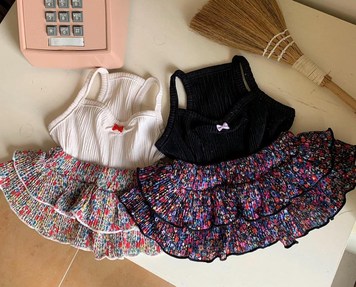 NKpup Tutu Tiered Skirt Dresses in white and black ribbed tops with colorful floral tiered skirts.