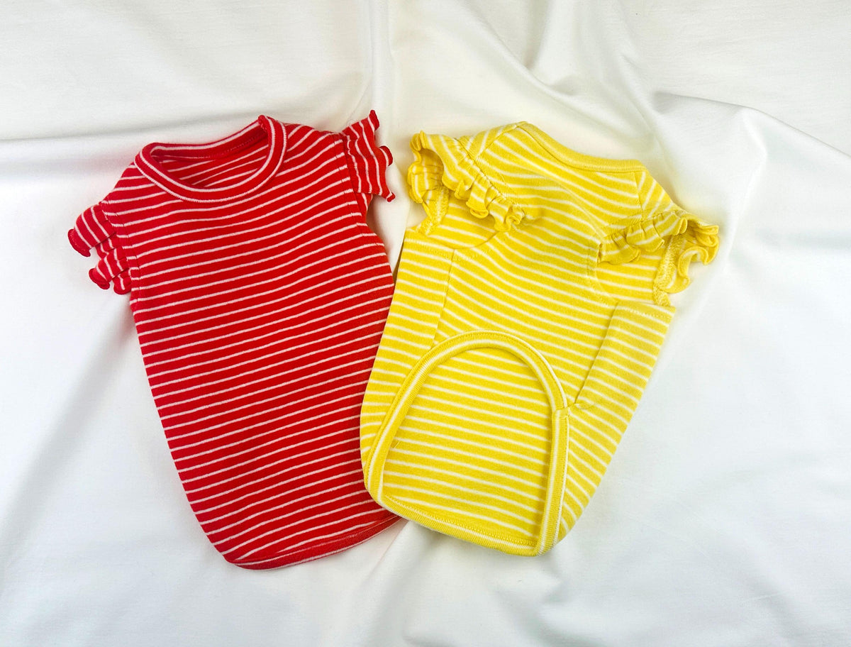 Red and yellow NKpup Sunny Stripe Ruffle Tees for dogs featuring horizontal stripes and ruffle sleeves.