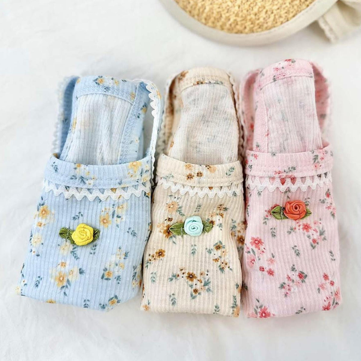 NKpup Vintage Rose Ribbed Tops for dogs in blue, cream, and pink with floral patterns and rose accents