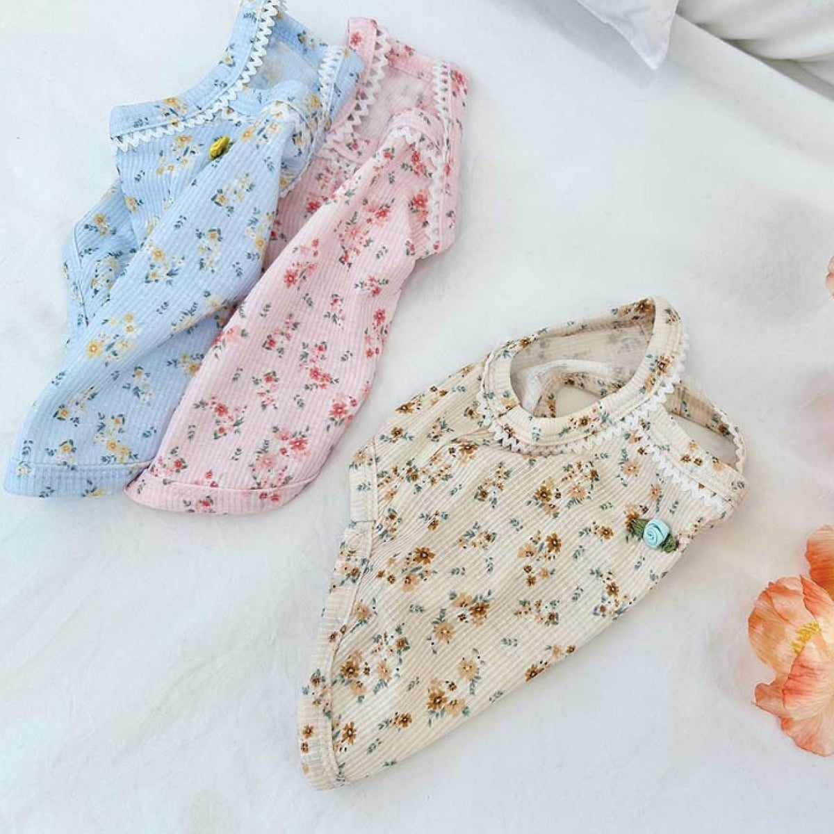 NKpup Vintage Rose Ribbed Top for dogs in light blue, pink, and beige floral patterns.