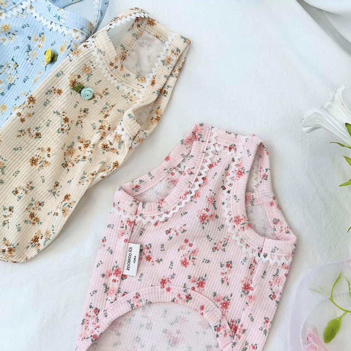 NKpup Vintage Rose Ribbed Top dog shirts in pink, beige, and blue floral patterns with lace trim
