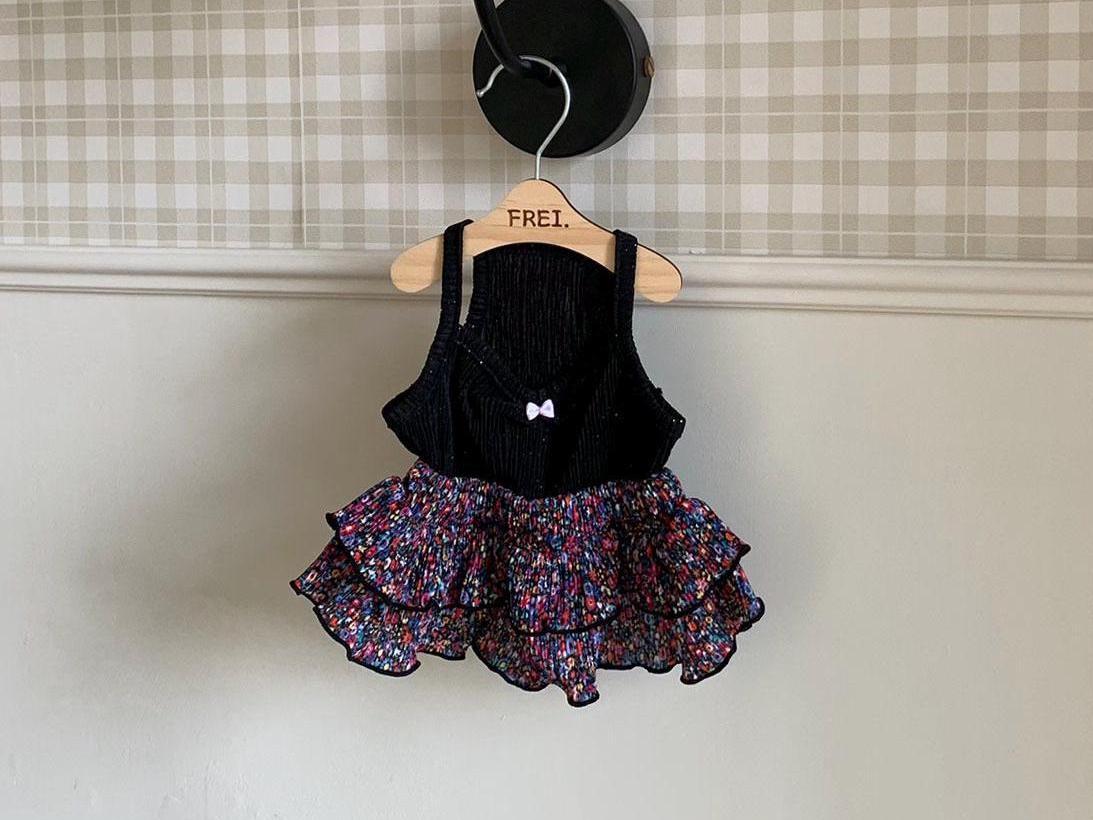 NKpup Tutu Tiered Skirt Dress with a black bodice and colorful multicolored patterned ruffled skirt