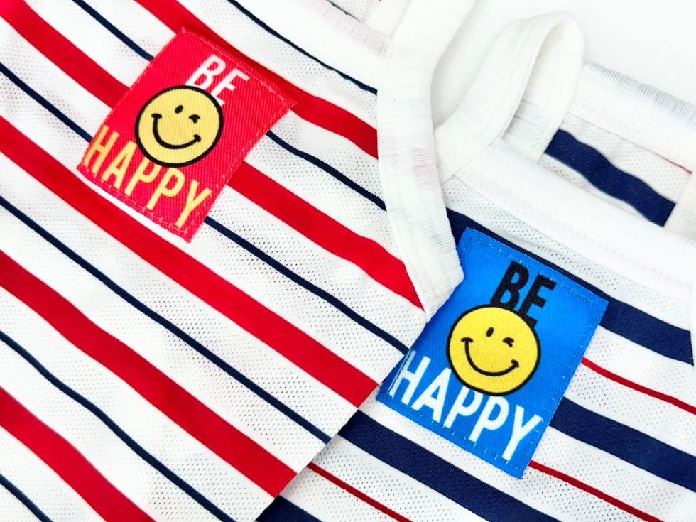 NKpup Be Happy Cooling Mesh Sleeveless Top featuring red and navy blue stripes with smiley face patches.