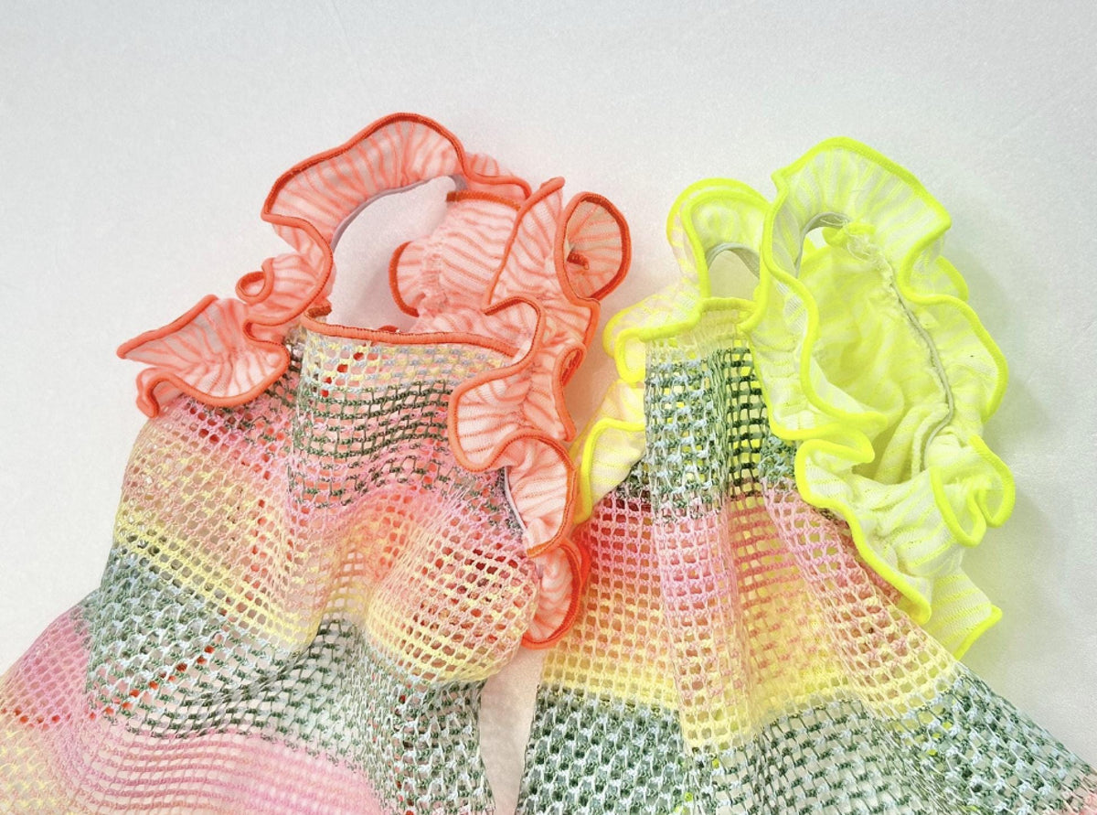 NKpup Rainbow Ruffle Mesh Top for dogs in pink and yellow patterns.