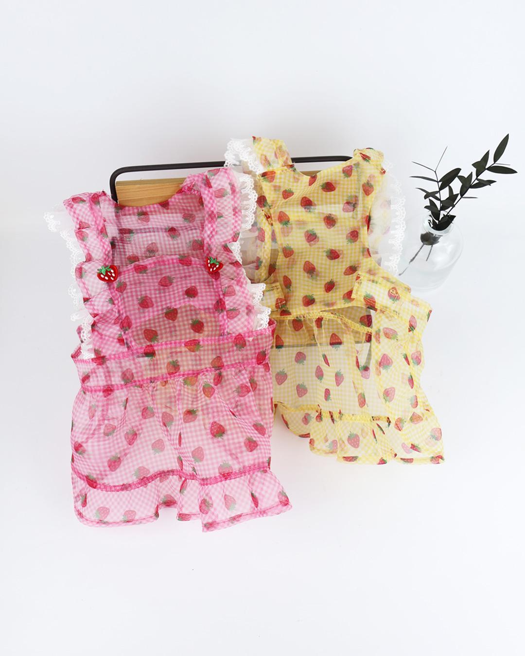 Strawberry Picnic dog dress in pink and yellow gingham with strawberry patterns and white lace trim