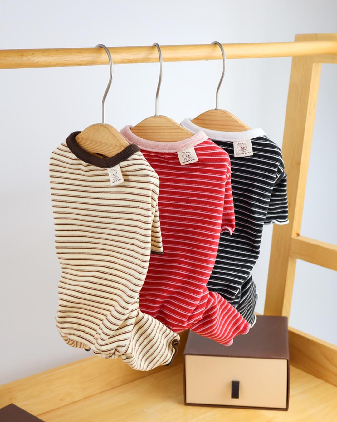 NKpup Everyday Striped Dog Overalls in beige, red, and black colors